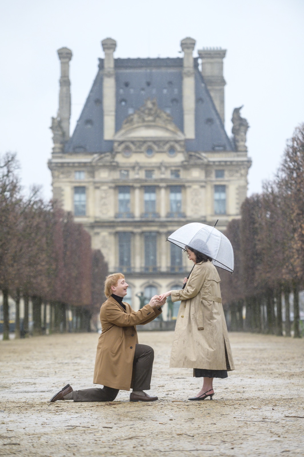 A surprise proposal beside the Louvre in Paris