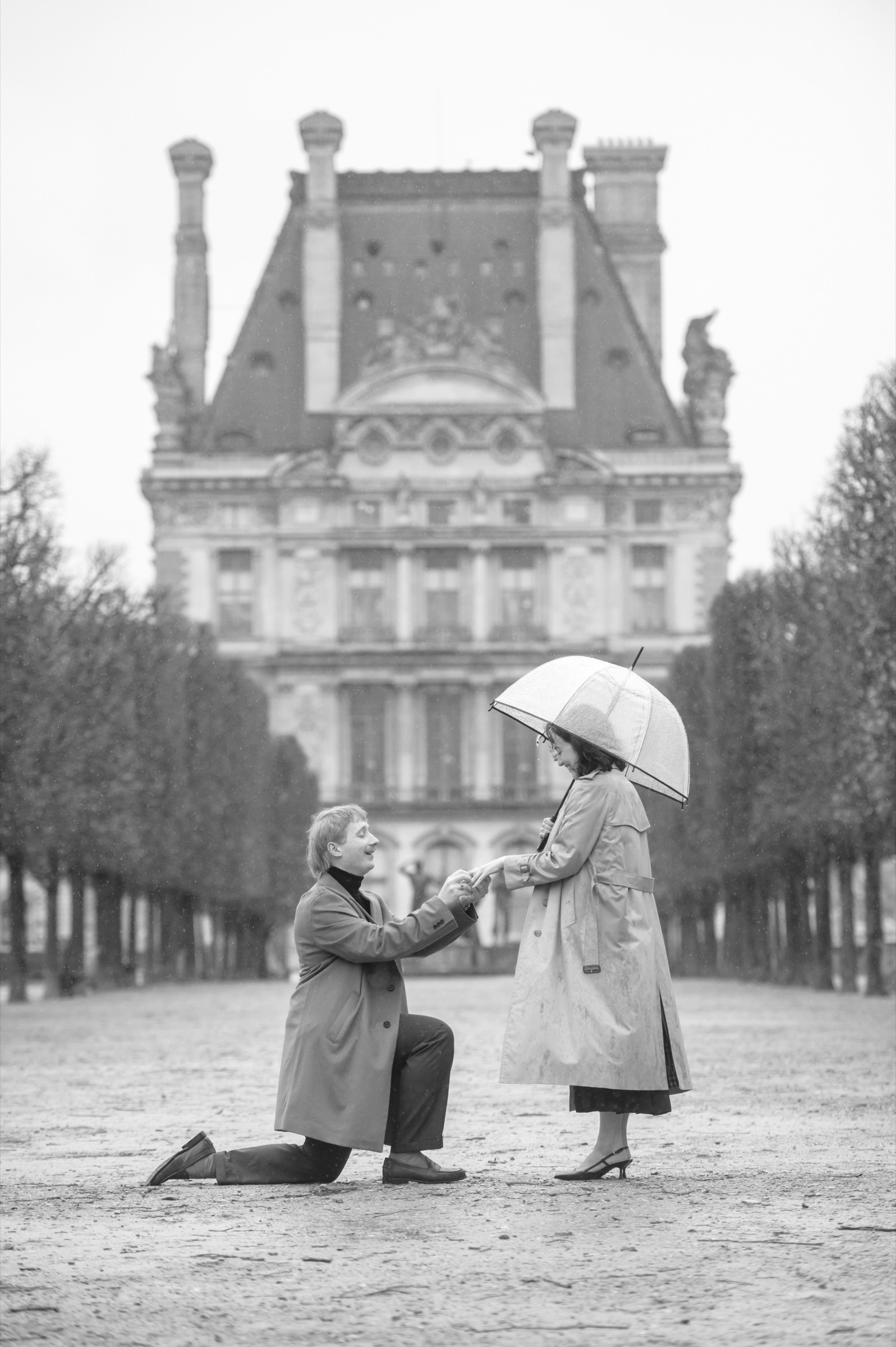 A couple during a secret proposal in Paris
